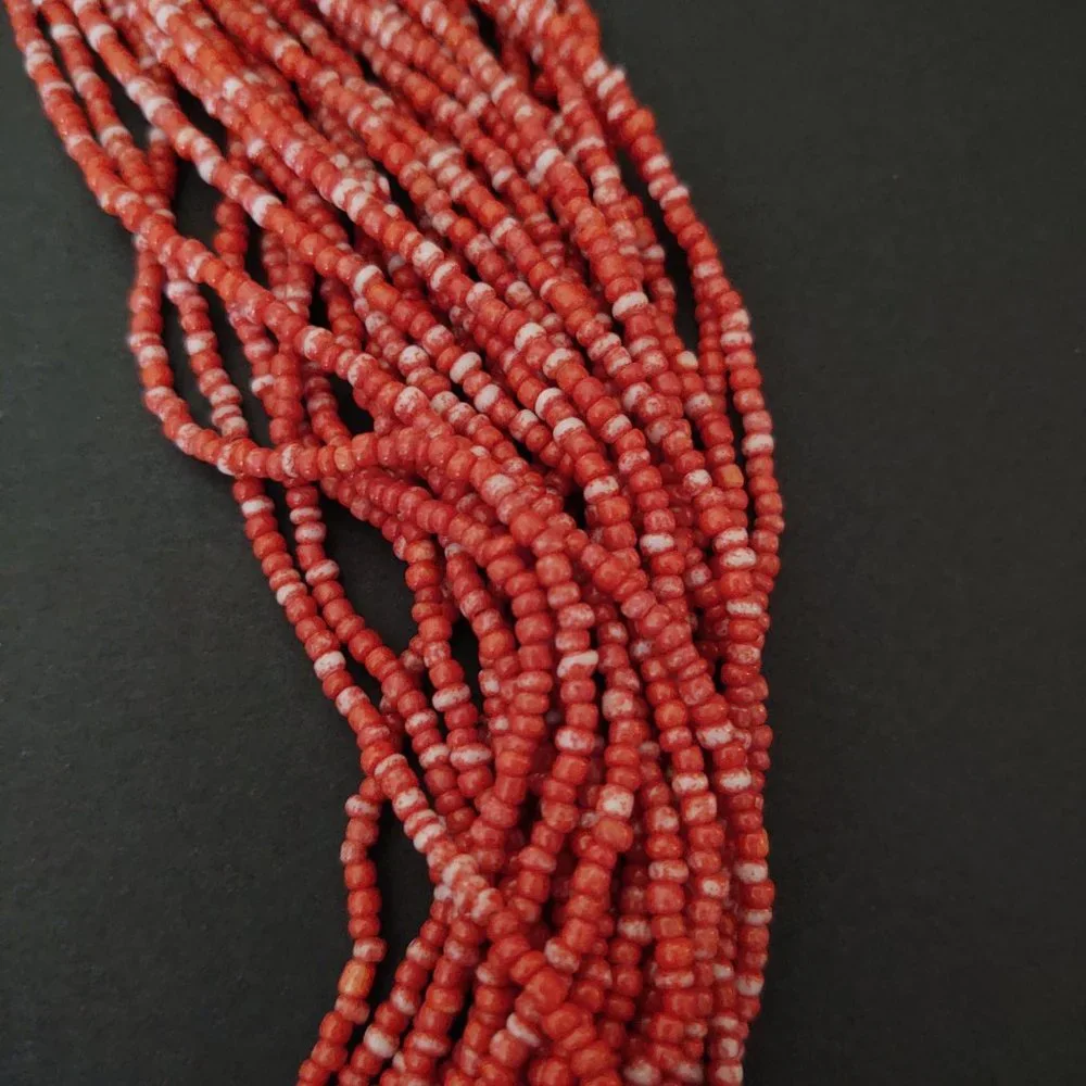 Orange and white multi strand seed bead necklace